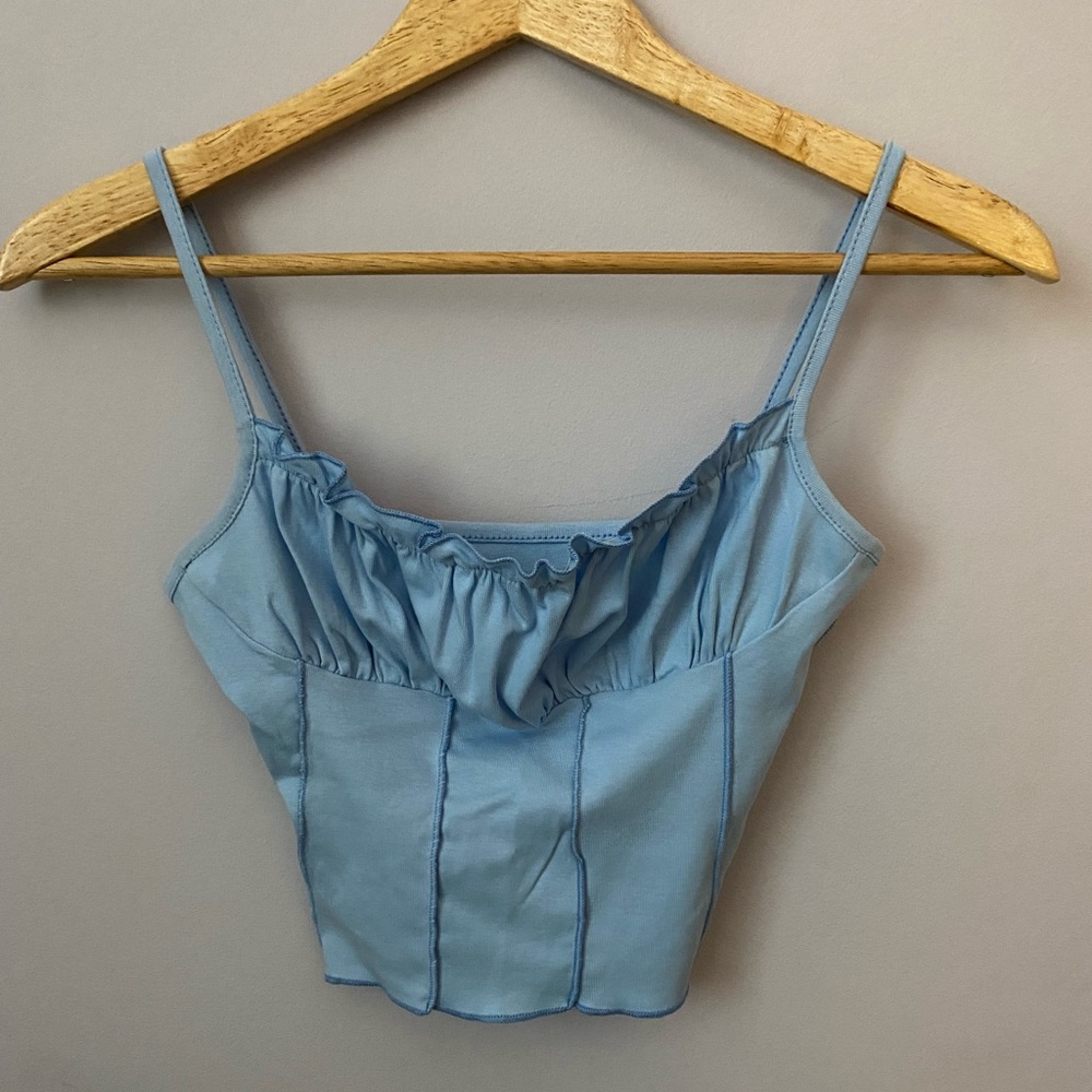 Blue cropped shirt